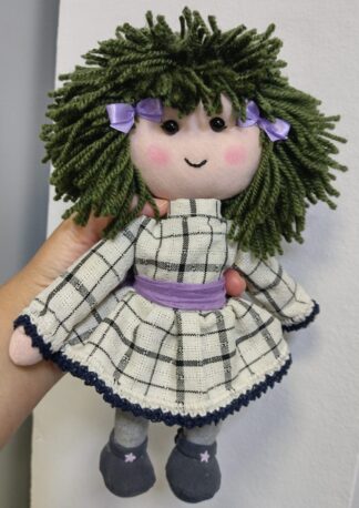 Muñecas y peluches